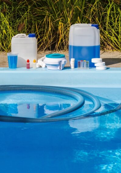 Swimming,Pool,Cleaning,In,Progress,With,Vacuum,Hose,And,Brush