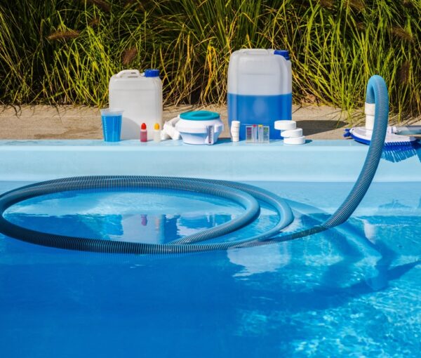 Swimming,Pool,Cleaning,In,Progress,With,Vacuum,Hose,And,Brush