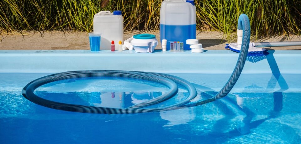 Swimming,Pool,Cleaning,In,Progress,With,Vacuum,Hose,And,Brush